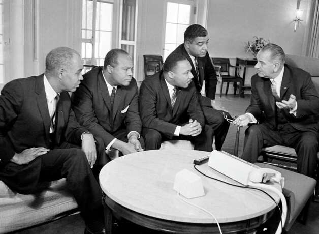 President Lyndon B. Johnson, right, talks with civil rights ...