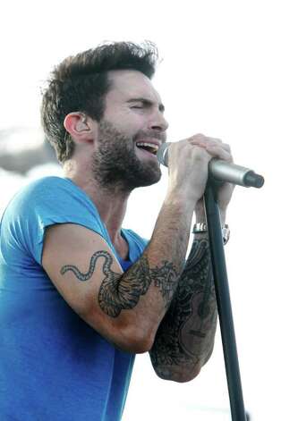 Maroon 5 lead singer Adam Levine performs during a concert on Pier 21 as 