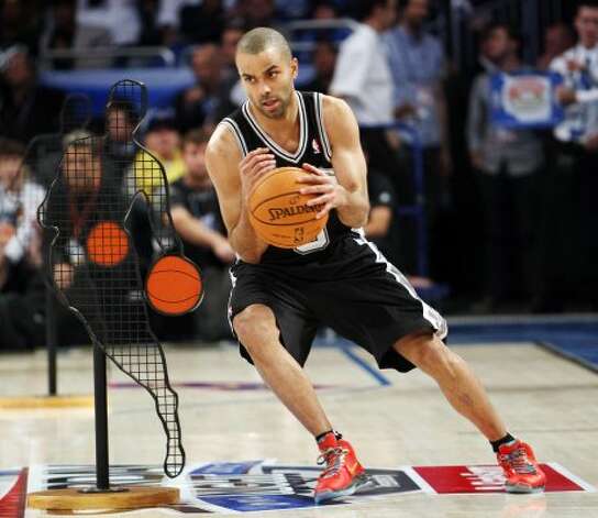 San Antonio Spurs' Tony Parker (9) participates in the NBA All-Star Skills Challenge basketball competition in Orlando, Fla., Saturday, Feb. 25, 2012. Parker won the event. (AP Photo/Lynne Sladky) (AP) / SA