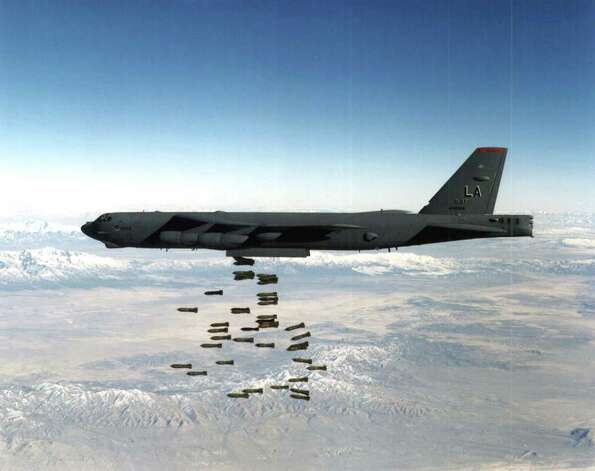 A U.S. Air Force B-52 drops bombs in this undated file photo. Photo: USAF, Getty Images / Getty Images North America