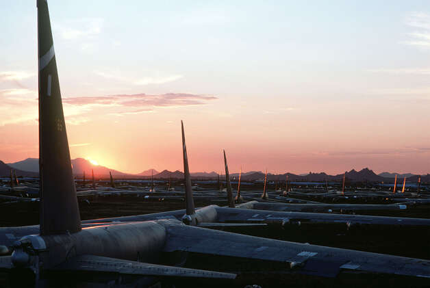 Dozens of inactive B-52s are bathed in the glow of the setting sun as they sit on the desert floor at the Aerospace Maintenance and Regeneration Group center at Davis-Monthan Air Base, in Tuscon, Ariz. Photo: USAF, U.S. Air Force / Getty Images North America