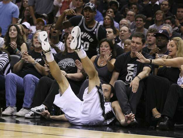 San Antonio Spurs' Manu Ginobili (20) falls out of bounds after the play during the first half of game two of the NBA Western Conference Finals in San Antonio, Texas on Tuesday, May 29, 2012. Edward A. Ornelas/Express-News (Edward A. Ornelas / San Antonio Express-News) / SA