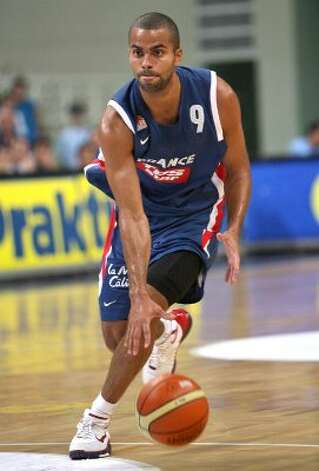 Tony Parker of France, dribbles the ball during the Acropolis Basketball tournament, in Athens' Olympic stadium , Greece, Wednesday, Aug. 2 , 2006 . NBA's San Antonio Spurs player was a top scorer of the tournament. (Petros Giannakouris / Associated Press) / SA