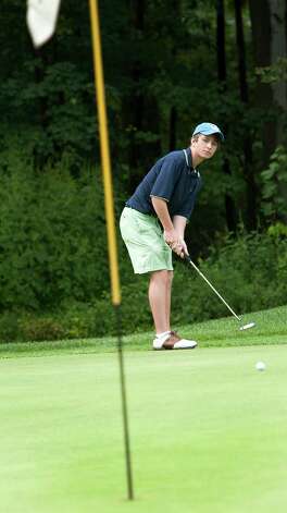 Playing in the boys 14 to 17 year old division Mark Schmeiler putts on the 18th green in the Greenwich Townwide Jr. golf championships held at Griffith E. Harris golf course, Greenwich, CT on Wednesdy August 15th, 2012. Photo: Mark Conrad / Stamford Advocate Freelance