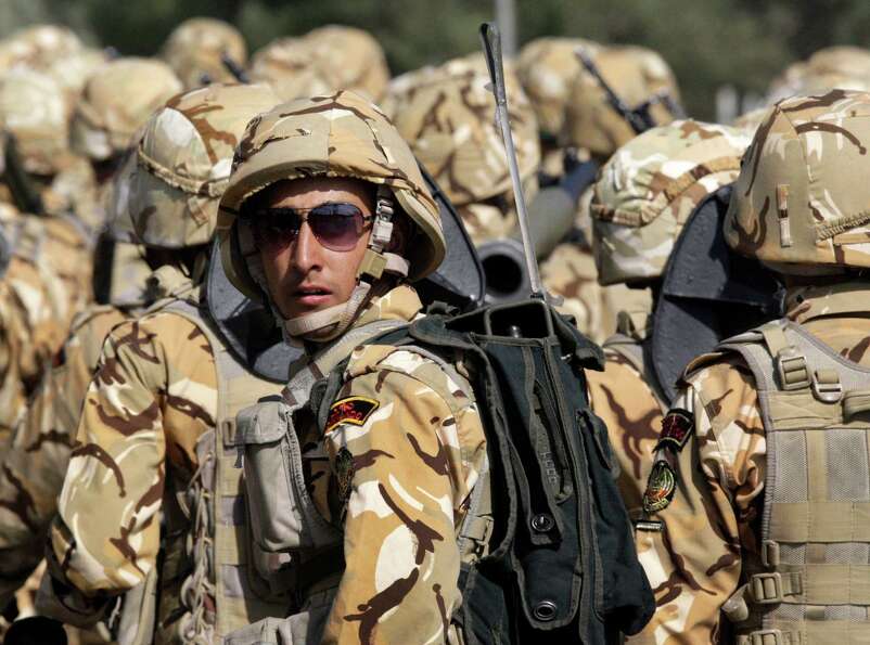 An Iranian army soldier participates in a military parade commemorating the start of the Iraq-Iran w