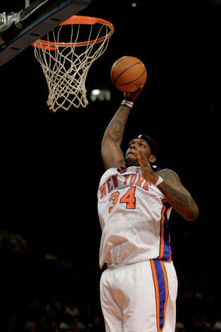 The New York Knicks' Eddy Curry goes up to the basket during the first quarter against the Miami Heat Monday, Feb. 26, 2007, at Madison Square Garden in New York. (Mary Altaffer / Associated Press) Photo: Mary Altaffer, AP / AP