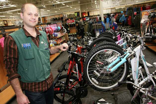 REI store manager Trevor Chabinsky in the bike section at the Norwalk ...