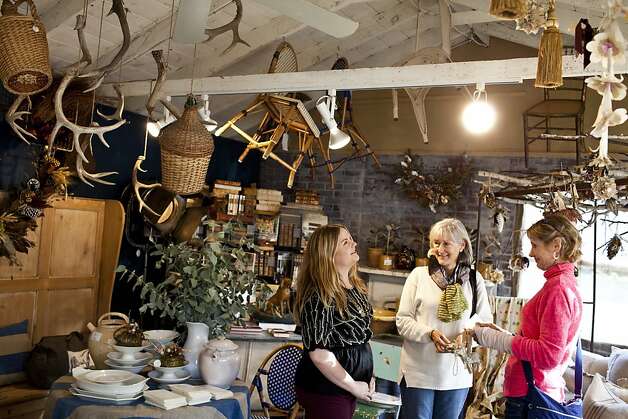 Gwynneth Alldis (left), daughter of Tancredi &amp; Morgen's owners, talks with shoppers Lorene Morgan and Louise Von Hasslen at the boutique in Carmel Valley. Photo: Jason Henry, Special To The Chronicle