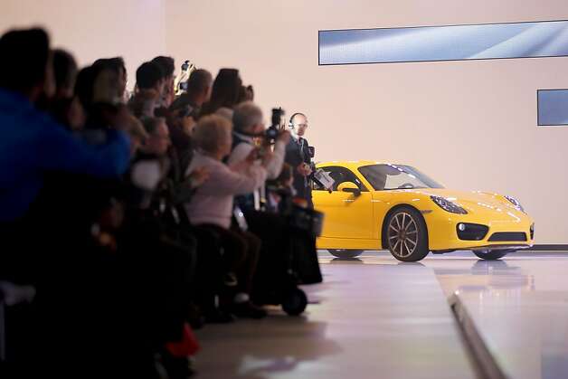 The new Porsche Cayman is introduced at the LA Auto Show in Los Angeles, Wednesday, Nov. 28, 2012. The annual Los Angeles Auto Show opened to the media Wednesday at the Los Angeles Convention Center. The show opens to the public on Friday, November 30. Photo: Jae C. Hong, Associated Press / SF
