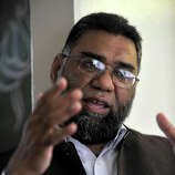 Imam Hafiz Haqqani Mian Qadri speaks to a reporter at the current home to the Stamford - square_gallery_thumb
