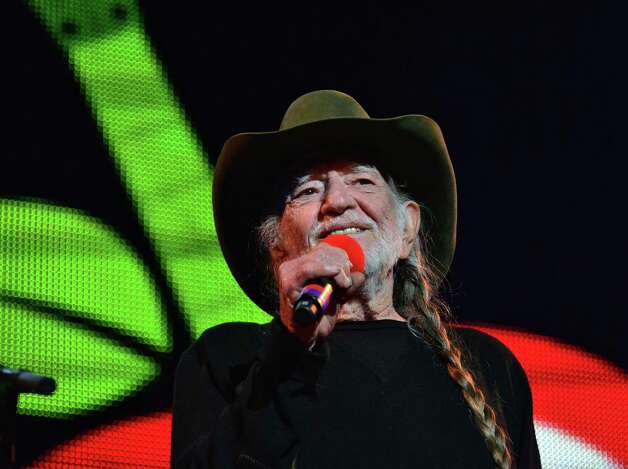 Willie Nelson on stage at Farm Aid 2013 at SPAC Saturday Sept. 21, 2013, in Saratoga Springs, NY.  (John Carl D'Annibale / Times Union) Photo: John Carl D'Annibale / 00023919A