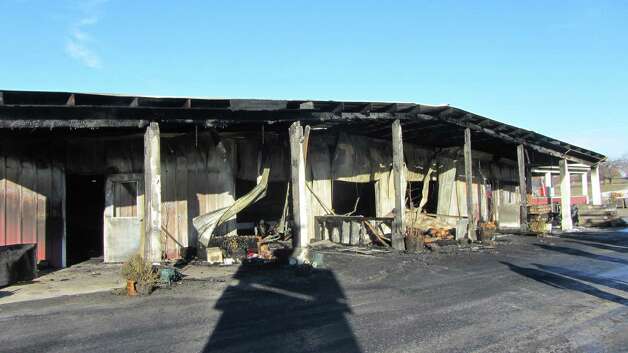 The Love Apple Farm in Ghent is shown on Thursday, Nov. 21, 2013, a day after fire struck. (Bob Gardinier)
