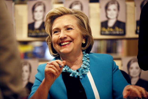 Hillary Rodham Clinton signs copies of her new book "Hard Choices" at the Common Good Books store, Sunday July 20, 2014 in St Paul, Minn. (AP Photo/The Star Tribune, Jerry Holt) ORG XMIT: MNMIT501 Photo: Jerry Holt / The Star Tribune
