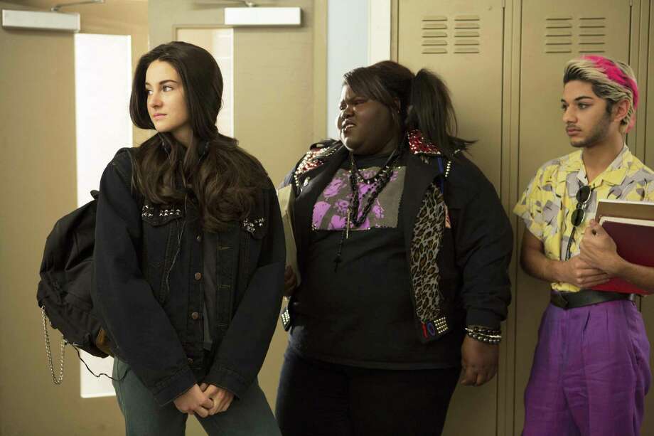 Kat (Shailene Woodley, left), Beth (Gabourey Sidibe) and Mickey (Mark Indelicato) deal with the complexities of teen life in “White Bird in a Blizzard.” Photo: Associated Press / Magnolia Pictures