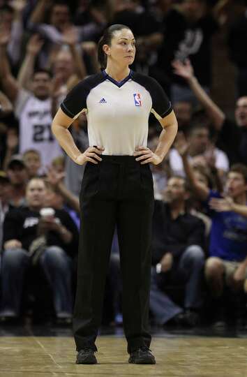 Rookie official Lauren Holtkamp officiates the Spurs against the.