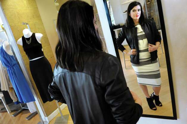 Circles saleswoman and denim buyer models Elizabeth and James separates, Vince leather jacket, Vince booties and Chan Luu Necklace on Wednesday, March 11, 2015, at Stuyvesant Plaza in Albany, N.Y. (Cindy Schultz / Times Union) Photo: Cindy Schultz / 00030922A