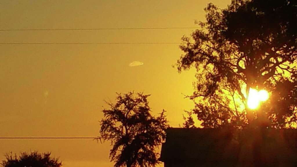 A woman in Seguin took this photo at 7:30 a.m. Sept. 23, 2015, and submitted it to the Mutual UFO Network (MUFON). She said she noticed a star to the east, which changed shape and flattened out to this disk shape. Photo: Mutual UFO Network (MUFON)