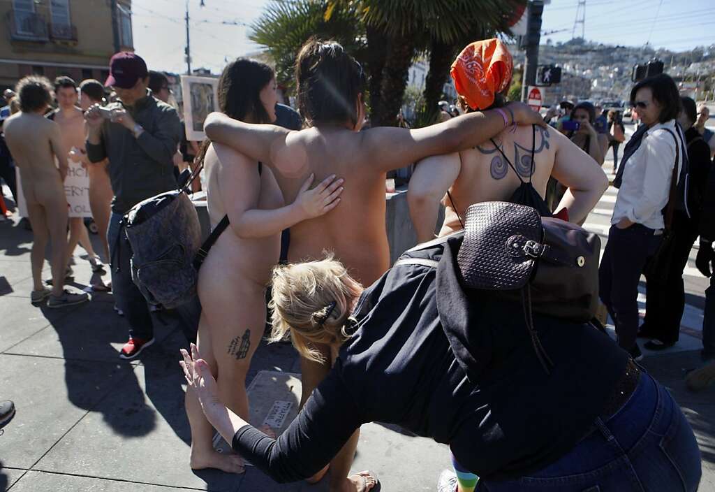 Participants of the first annual Valentine's Nude Parade put together by the Body Freedom Network, pose for pictures prior to the start of the walk in San Francisco, Calif., on Saturday Feb. 13, 2016 Photo: Brittany Murphy, The Chronicle