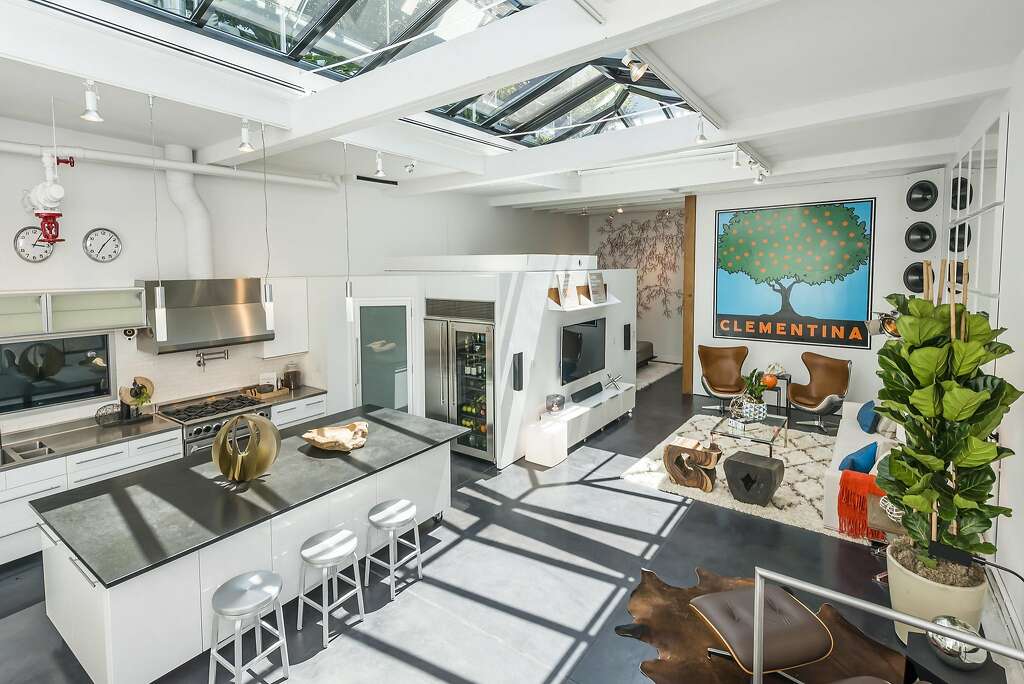 The skylight stretches above the great room, integrating the indoors and out. Photo: Olga Soboleva / Vanguard Properties