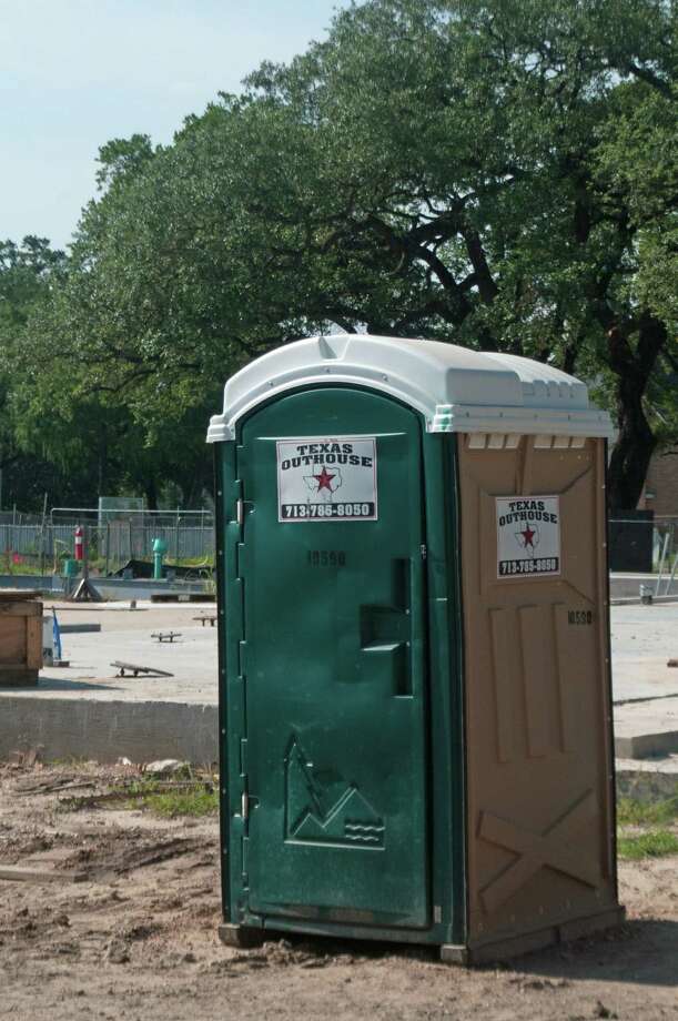 A Texas Outhouse portable toilet sports its trademarked logo of the outline of Texas and a lone star.  Photo: Rick Campbell, Freelance / Houston Chronicle