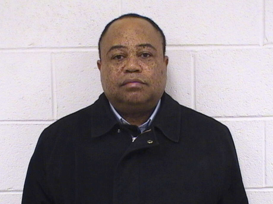 Rev. Honore Kombo, a Roman Catholic Priest was arrested by Seymour Police Detectives Feb. 29, 2016 for embezzling money from St. Augustine Church in Seymour. Photo: Contributed Photo / Contributed Photo / Connecticut Post Contributed
