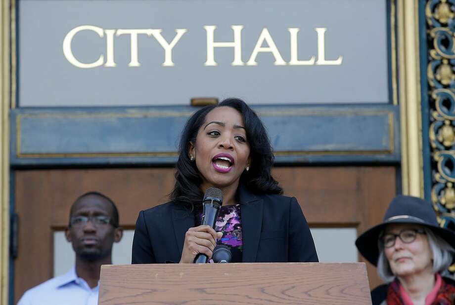 Supervisor Malia Cohen speaks ouside of City Hall in San Francisco. Cohen wants to create a task force to assess the feasibility of establishing a San Francisco-owned bank. Photo: Jeff Chiu, Associated Press