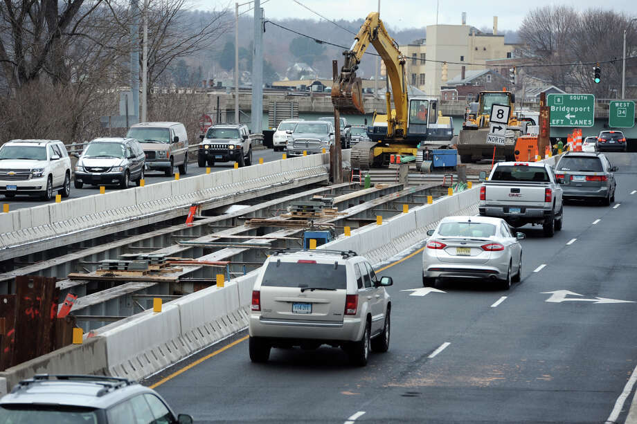Traffic travels through the construction zone on the Main Street (Rt. 34) bridge, over the Naugatuck River, seen here looking towards downtown Derby, Conn. March 4, 2016. Photo: Ned Gerard Ned Gerard / Hearst Connecticut Media / Connecticut Post