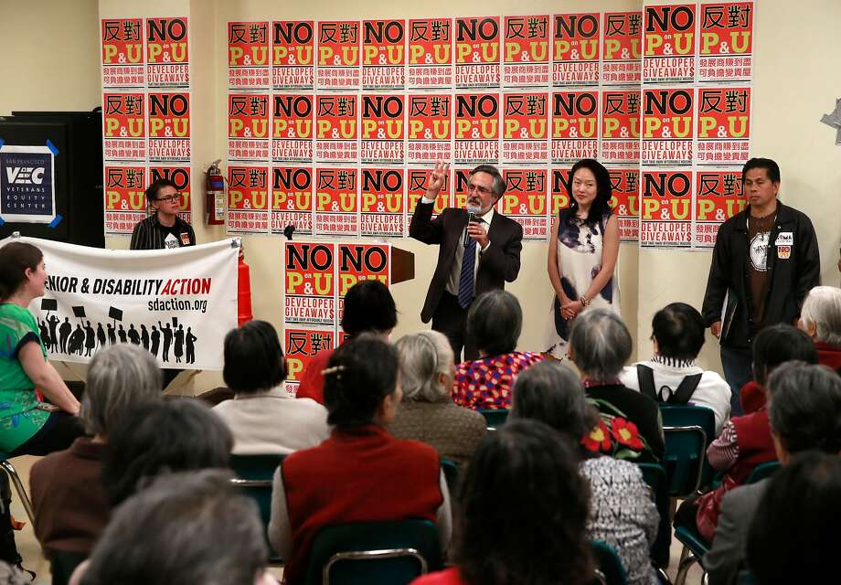 San Francisco supervisors Aaron Peskin and Jane Kim join San Francisco tenants, leaders of tenants, labor, non-profit housing and faith organizations as they hold a No on propositions P and U rally at Glide Memorial Church in San Francisco, Calif., on Wed. Sept. 7, 2016. Photo: Michael Macor, The Chronicle