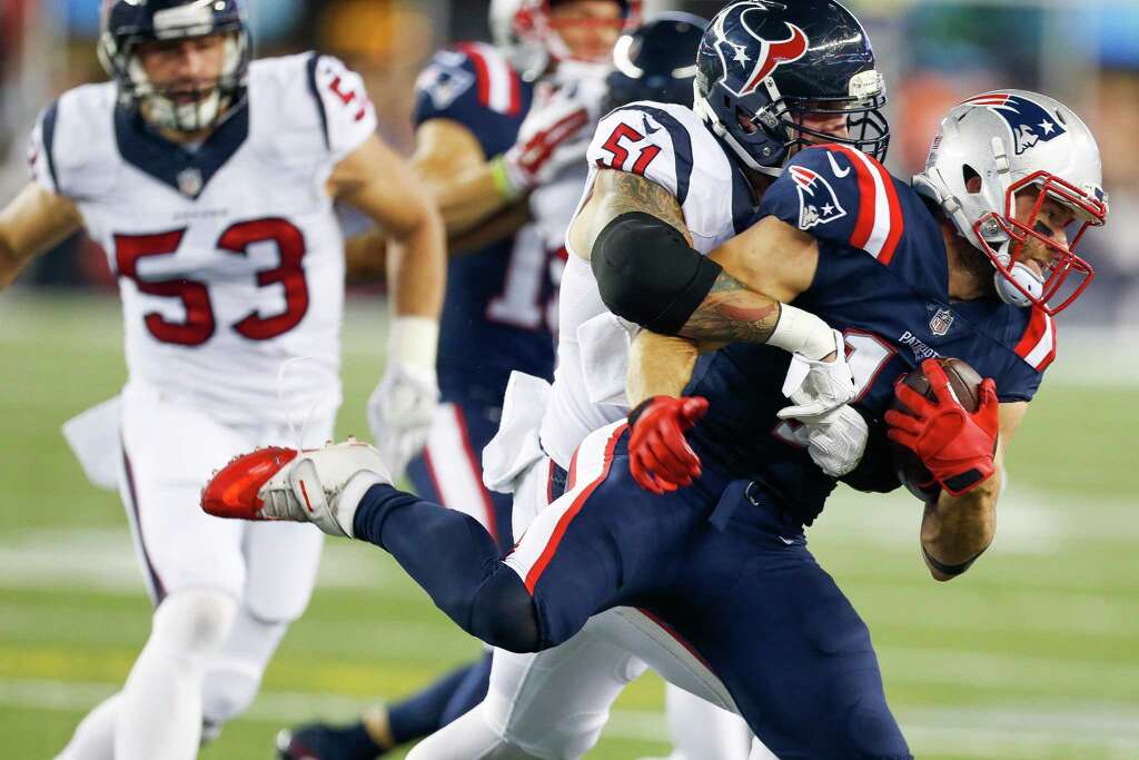 Houston Texans outside linebacker John Simon (51) pushes New England Patriots wide receiver Julian Edelman (11) out of bounds during the first quarter of an NFL football game at Gillette Stadium on Thursday, Sept. 22, 2016, in Foxborough, Mass. Photo: Brett Coomer, Houston Chronicle / © 2016 Houston Chronicle