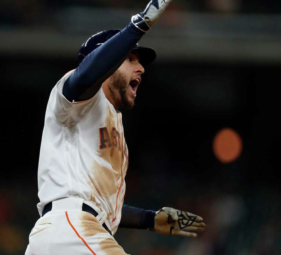 Houston Astros George Springer (4) celebrates his ground-rule double during the sixth inning of an MLB game at Minute Maid Park, Tuesday, Sept. 27, 2016 in Houston. Photo: Karen Warren, Houston Chronicle / 2016 Houston Chronicle
