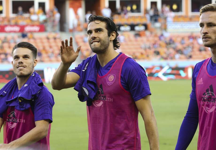 Orlando City SC midfielder Kaka (10) visited James Harden and the Rockets during their playoff game against the Spurs on Sunday night. The game came one day after Orlando City lost to the Dynamo, 4-0, at BBVA Compass Stadium. Photo: Yi-Chin Lee/Houston Chronicle
