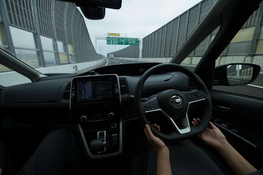 Chronicle staff writer Wendy Lee takes a test drive in a Nissan Serena minivan equipped with the ProPilot system in Yokohama, Japan. Photo: Takashi Aoyama, Special To The Chronicle