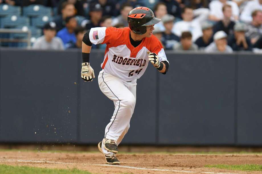 FCIAC Championship Baseball Game action between the Wilton Warriors and the Ridgefield TIgers at Harbor Yard on May 26, 2017 in Bridgeport, Connecticut. Photo: Gregory Vasil / For Hearst Connecticut Media / Connecticut Post Freelance