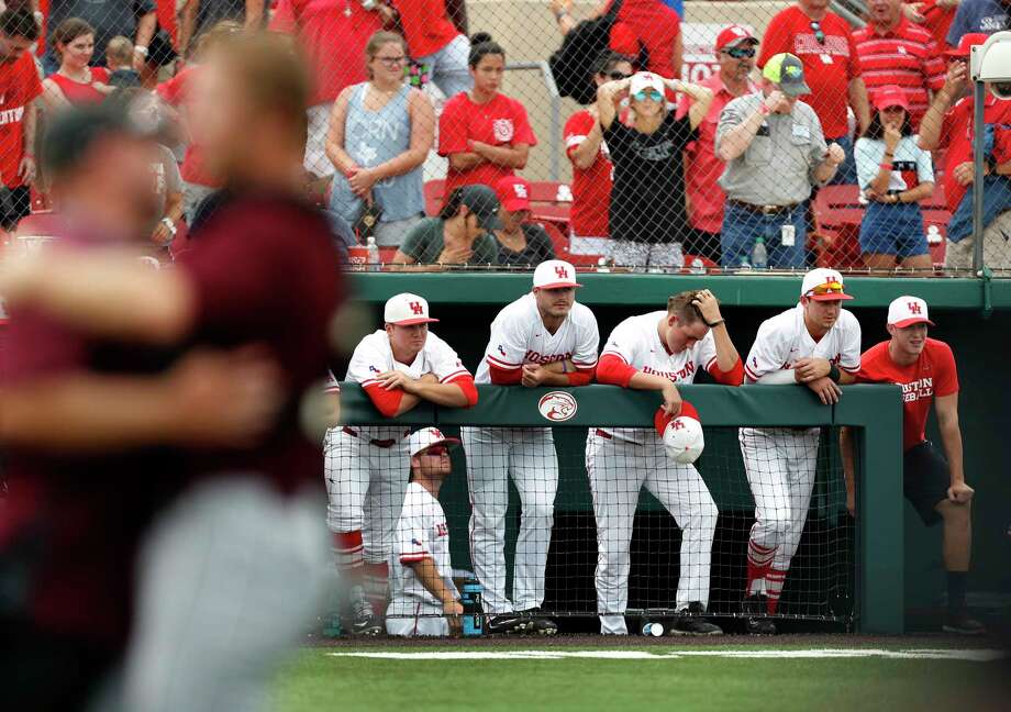 It was painful for UH players to watch A&amp;M celebrate winning a regional on the Cougars' home field. Photo: Karen Warren, Staff Photographer / 2017 Houston Chronicle