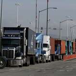 Drivers line up at the TraPac Terminal during a lunch-hour break at the Port of Oakland.