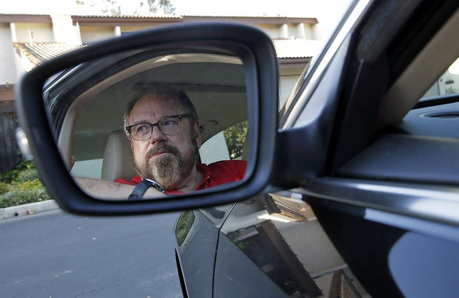 Bob Rand of Pasadena is trying to sell his 2014 fully loaded diesel Volkswagen Passat. The prices on used models has fallen. Photo: Chris Carlson, Associated Press