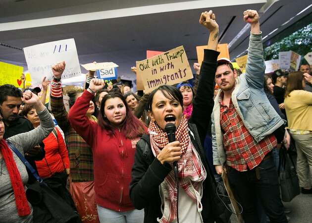 More than 1,000 protesters rally at SFO against immigration ban