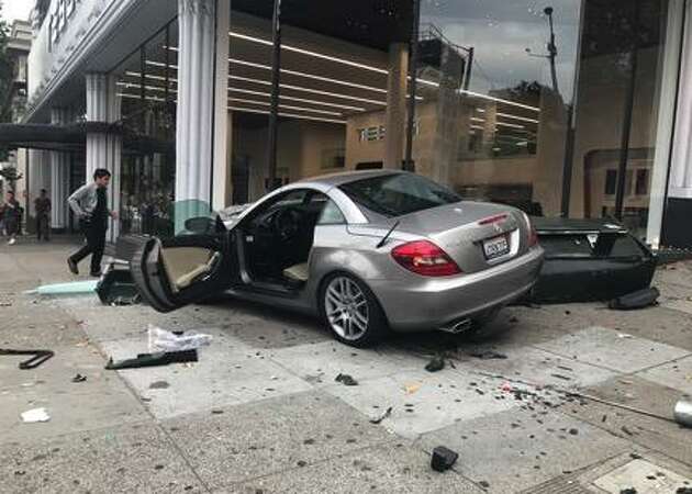 Car slams into SF Tesla dealership on Van Ness Avenue Monday