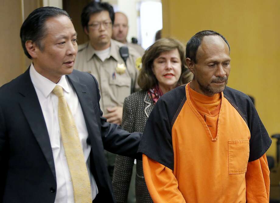 FILE - In this July 7, 2015 file photo, Jose Ines Garcia Zarate, right, is led into the courtroom by San Francisco Public Defender Jeff Adachi, left, and Assistant District Attorney Diana Garciaor, center, for his arraignment at the Hall of Justice in San Francisco.  Photo: Michael Macor, San Francisco Chronicle