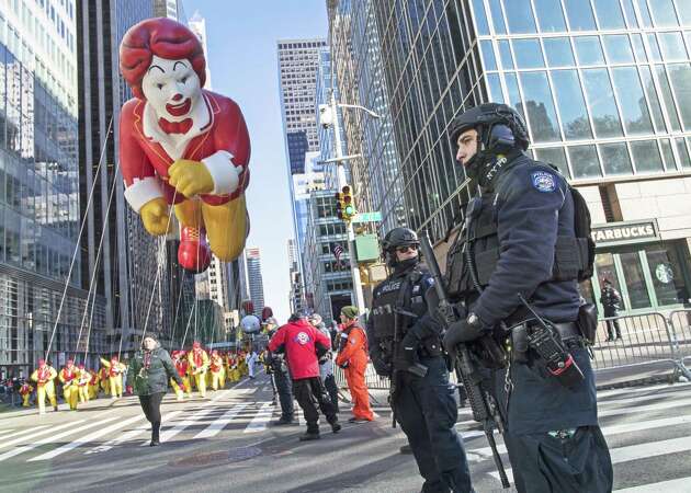 Macy's Thanksgiving parade revels on amid tight security